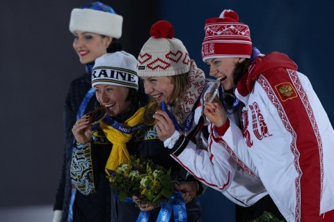 SEMERENKO Vita, , KUZMINA Anastasia, , VILUKHINA Olga. Sochi 2014. Women\'s sprint award ceremony